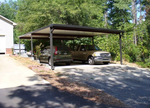 Flat bronze freestanding carport near Greer, SC.